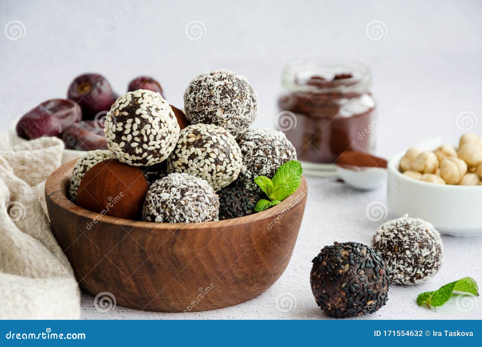 Energy Balls. Truffles of Dates, Walnuts, Hazelnuts and Cocoa in a