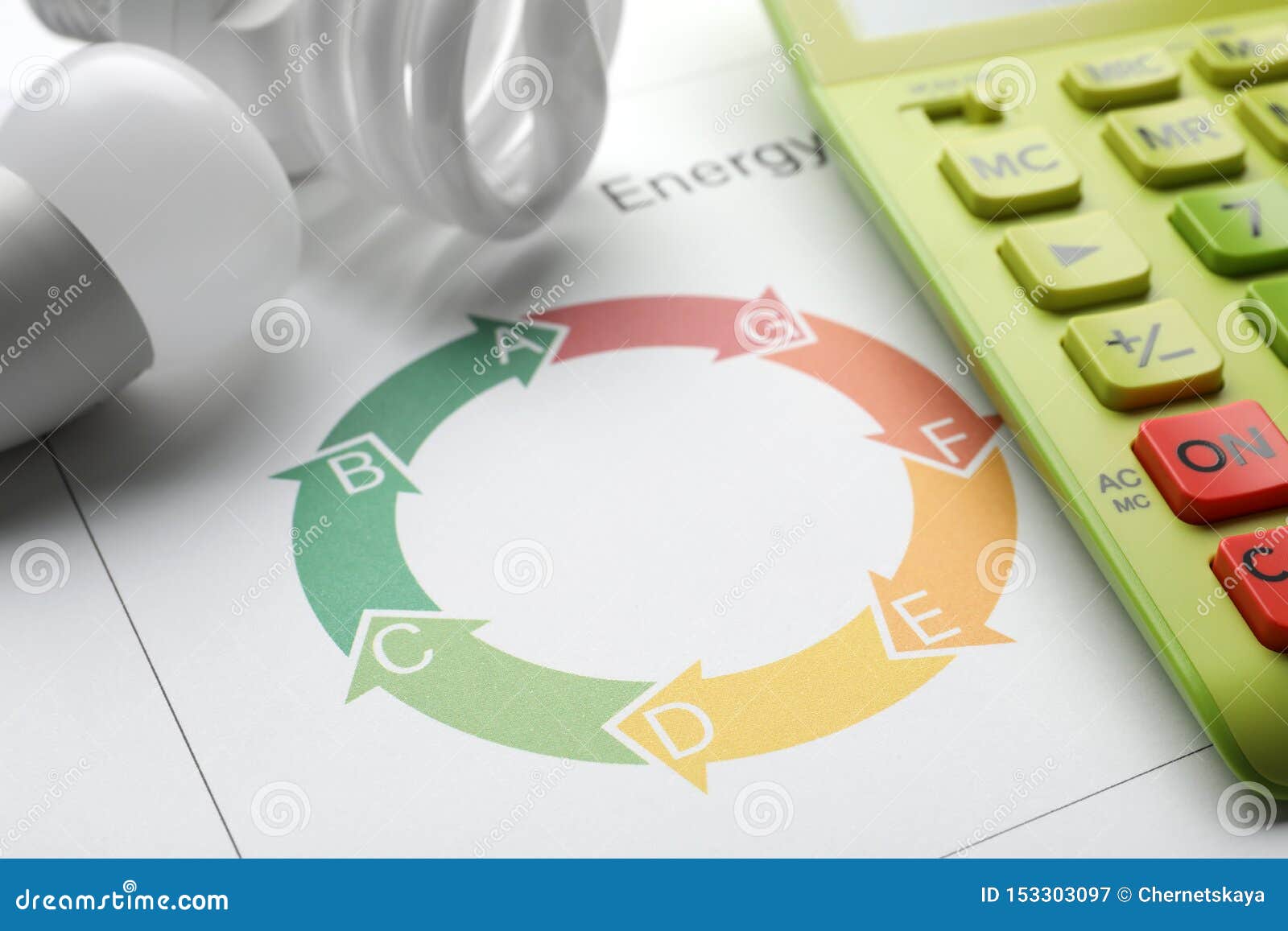 Energy Efficiency Rating Chart, Light Bulbs and Calculator on White