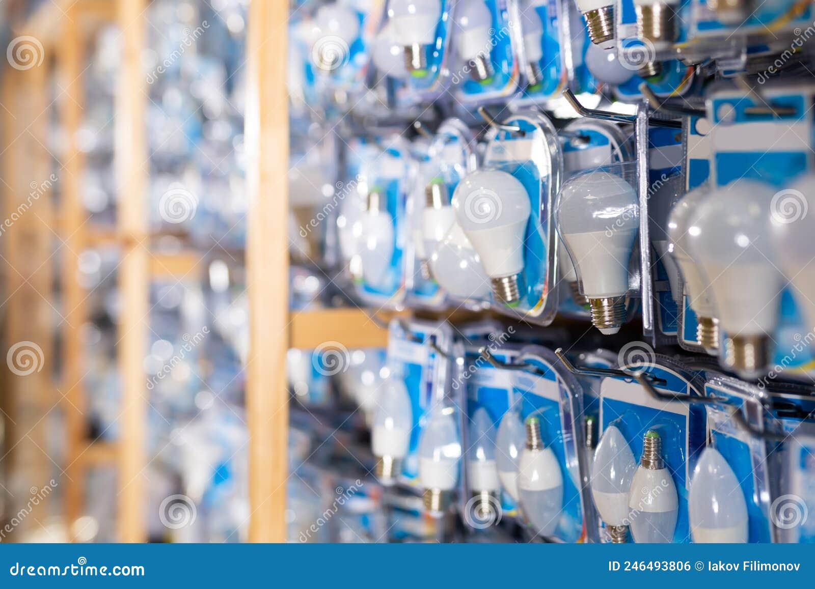 Energy Saving Lamps on Shelves of an Electrical Goods Store Stock Photo