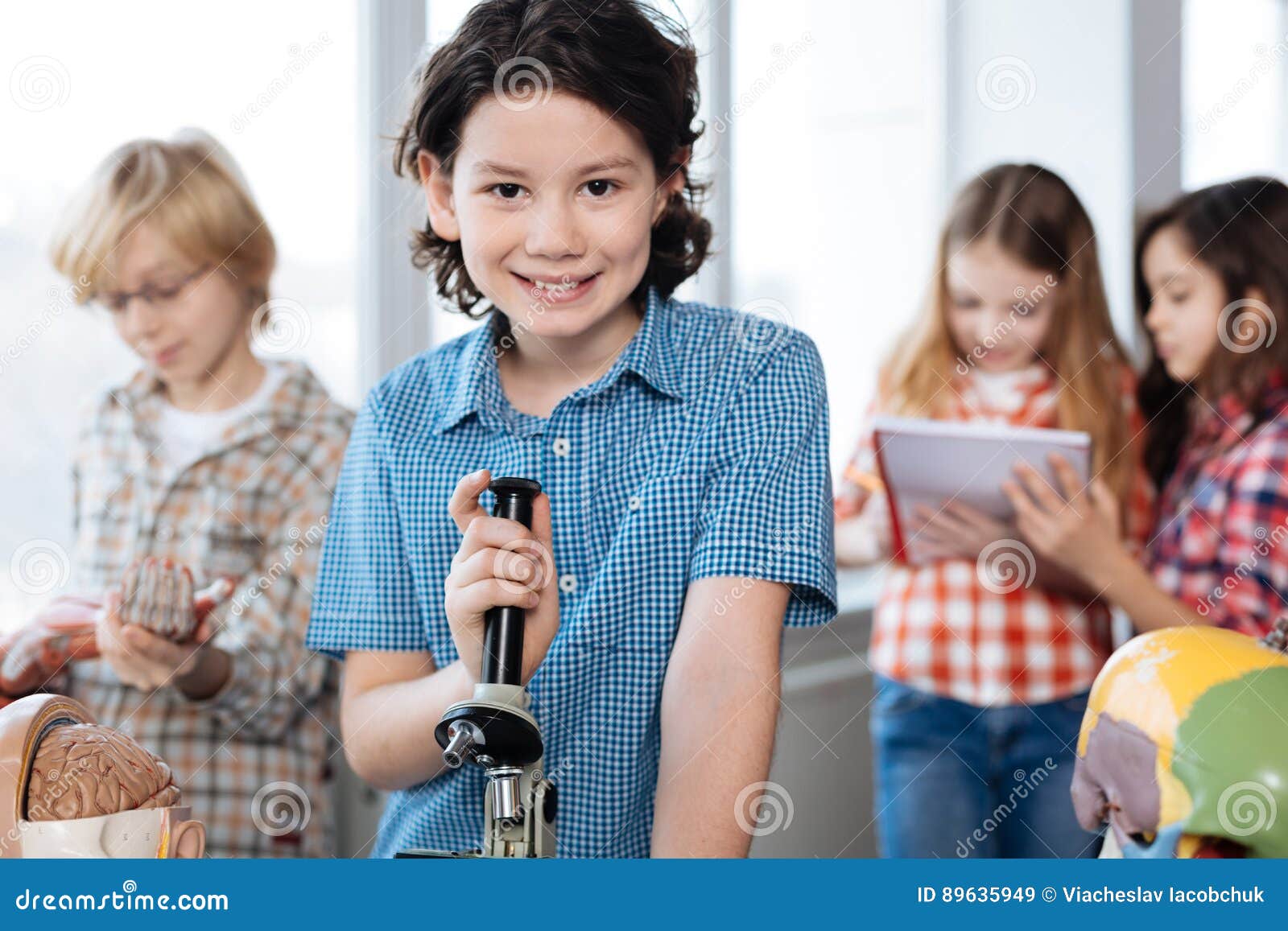 engaging joyful student conducting a lab experiment