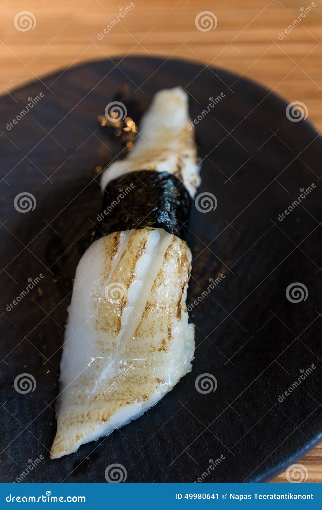 Engawa Sushi stock image. Image of sushi, piece, black 49980641