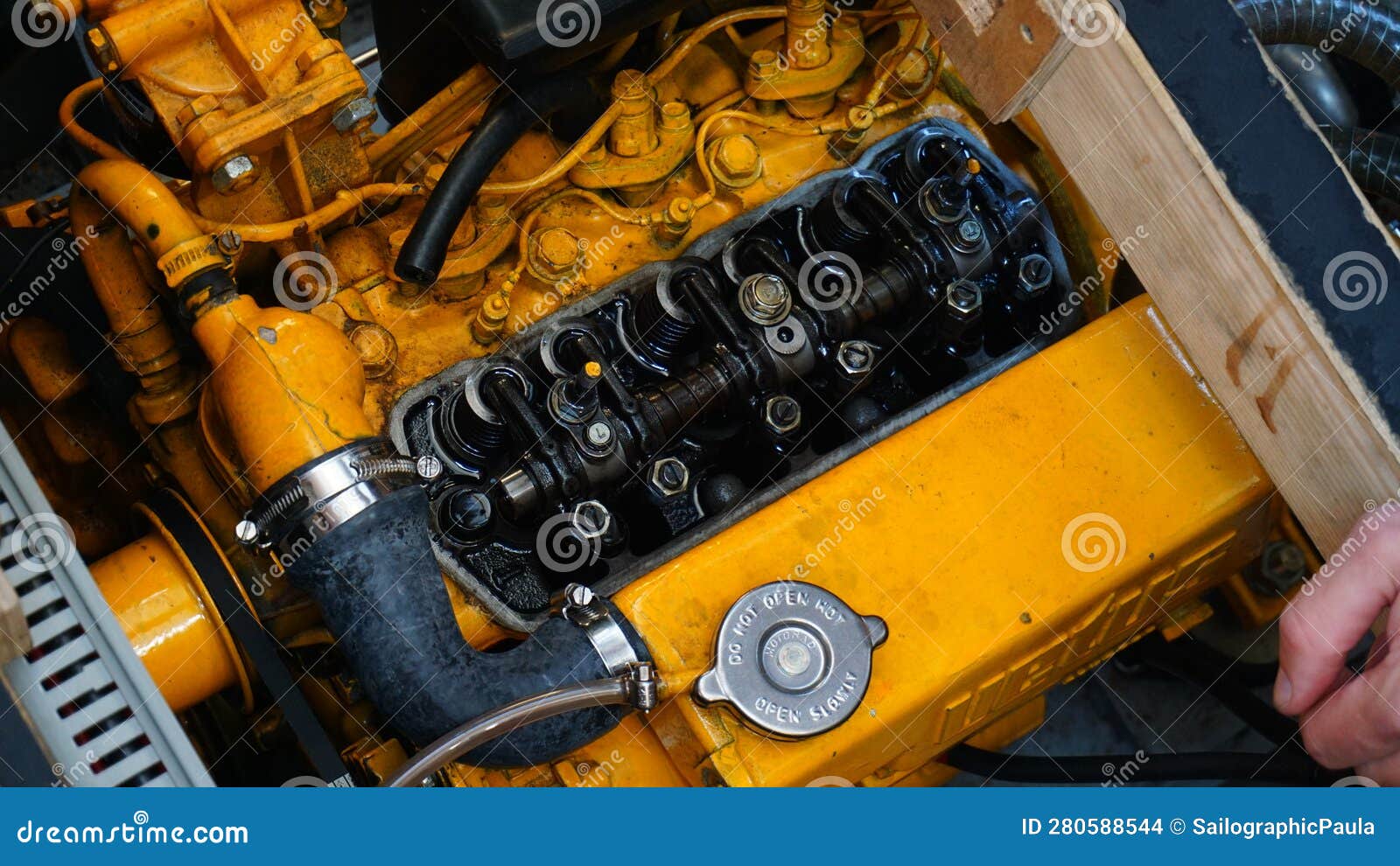 Engine of a Boat that Moves on Diesel Fuel. Adjusting the Valves and Maintenance. Stock Photo