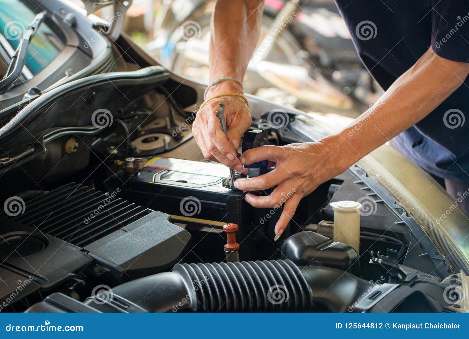 Engine Engineer is Replacing Car Battery because Car Battery is
