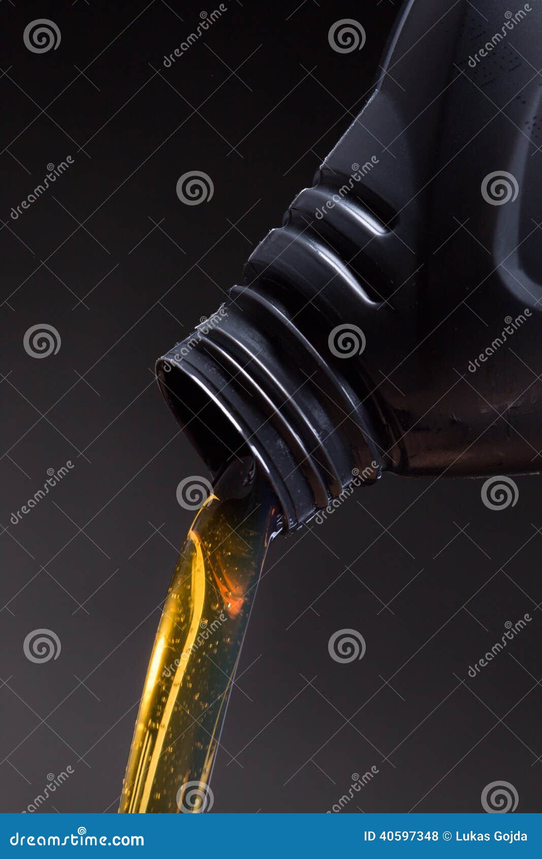 Engine oil beeing poured stock photo. Image of gallon 40597348