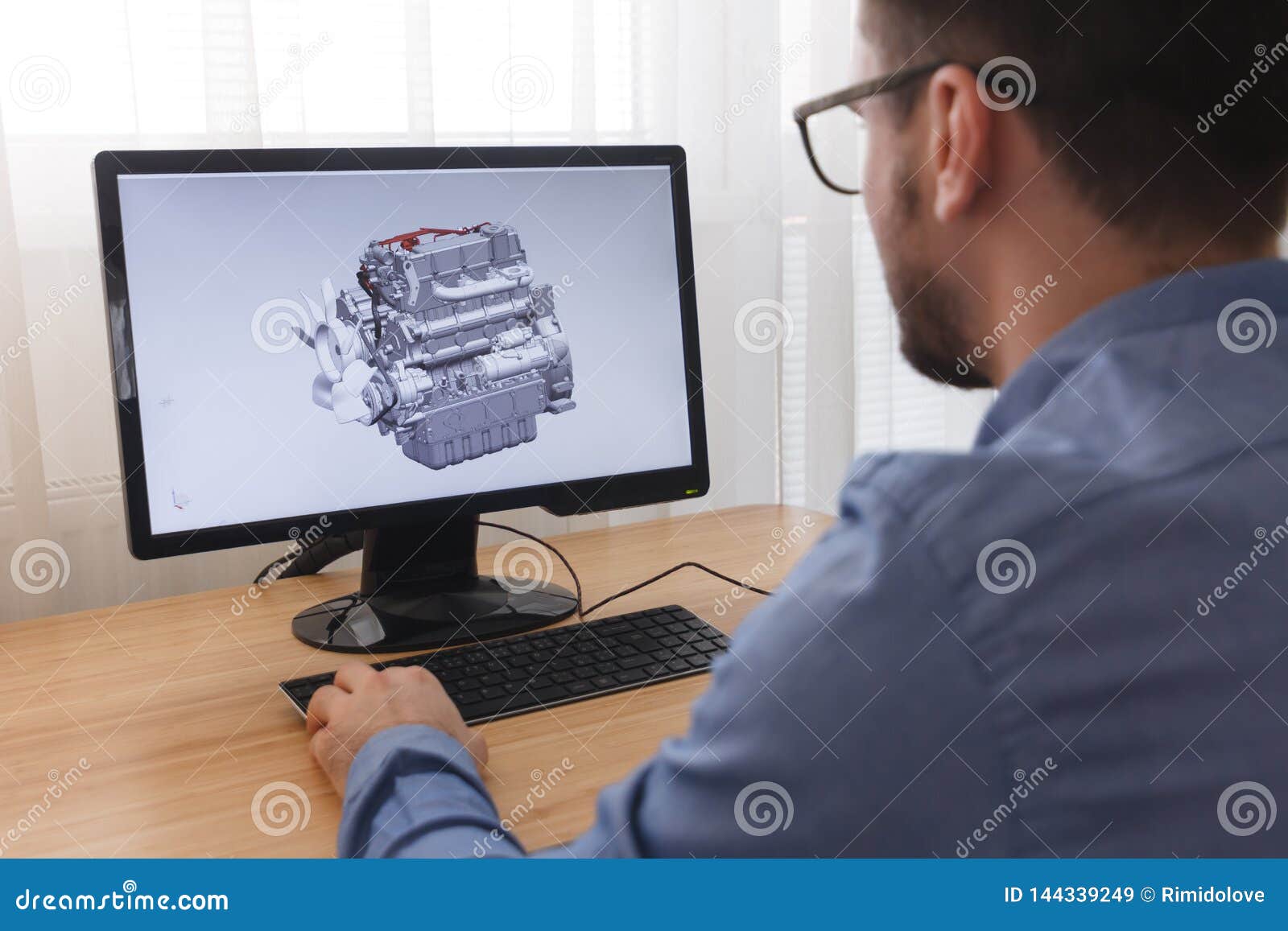 Engineer Constructor Designer In Glasses Working On A Personal