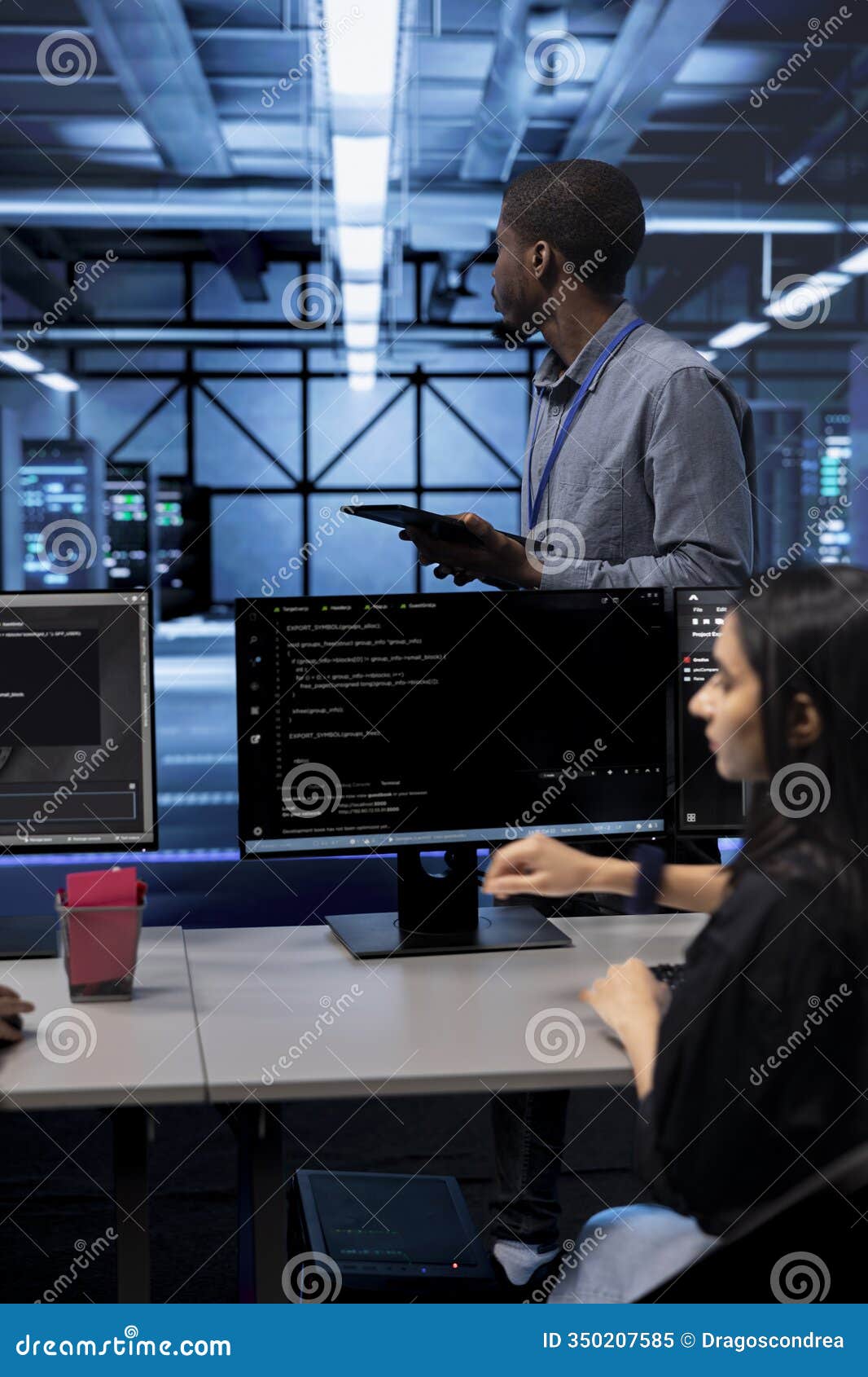 engineer in data center updating systems to keeps performance up