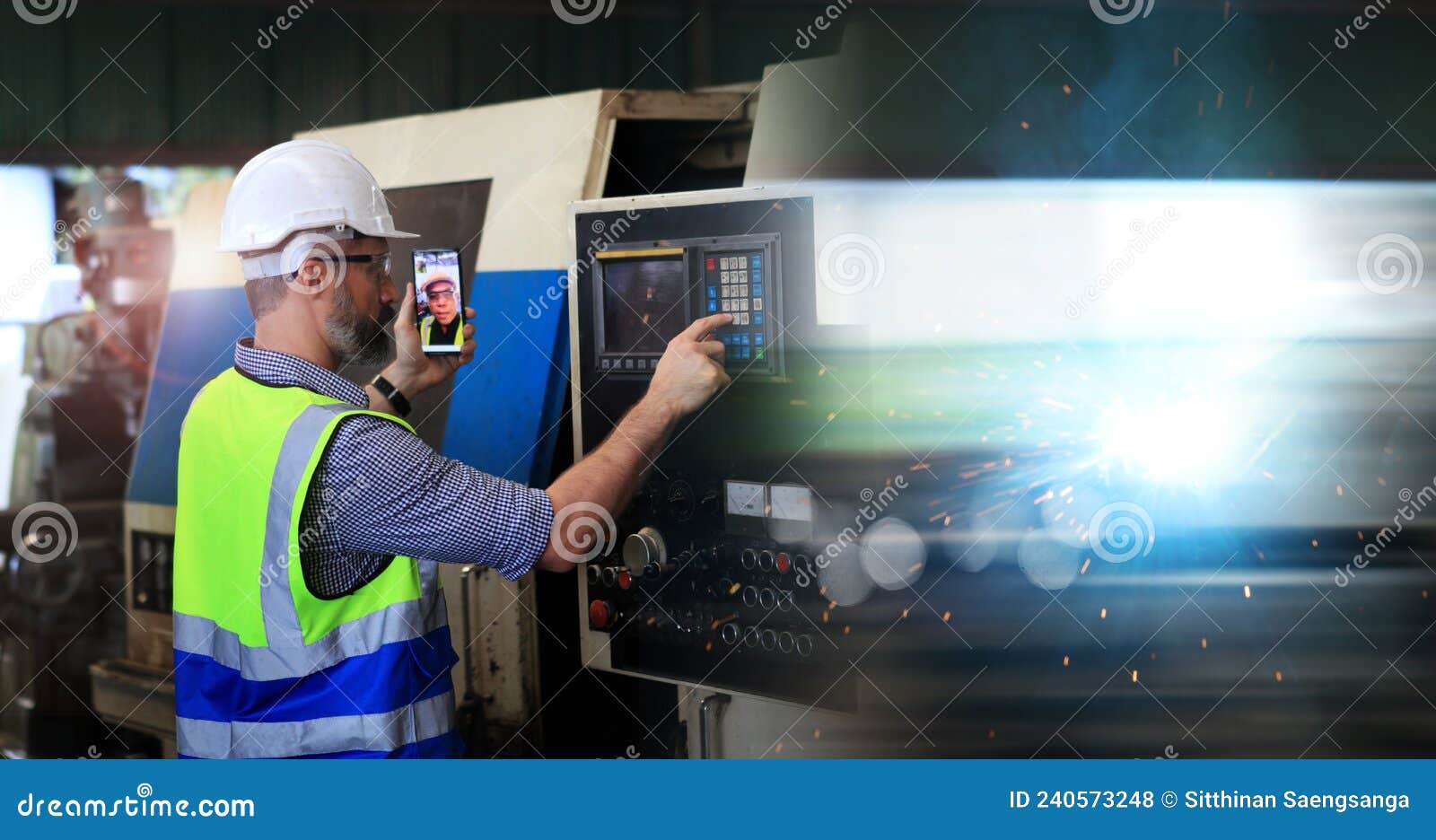 engineer holding smartphone using vdo call  internet technology , engineer control and inspection big machine industrial