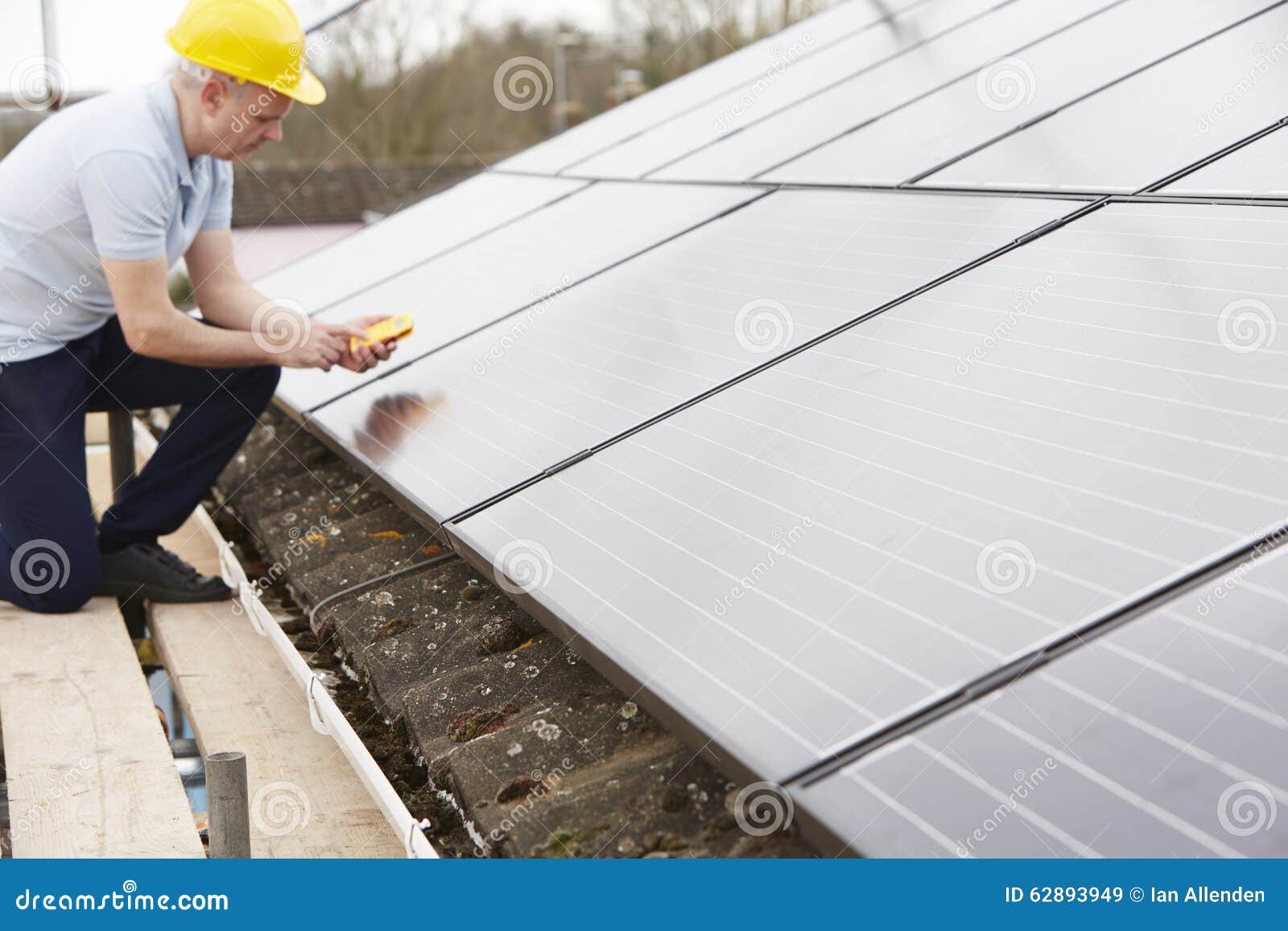 Engineer Installing Solar Panels on Roof of House Stock Image Image