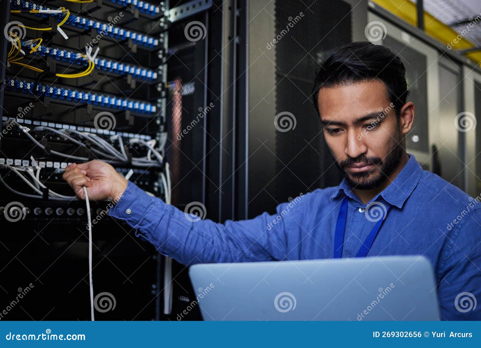 Engineer Laptop, Server Room and Cable Connection for Software Update