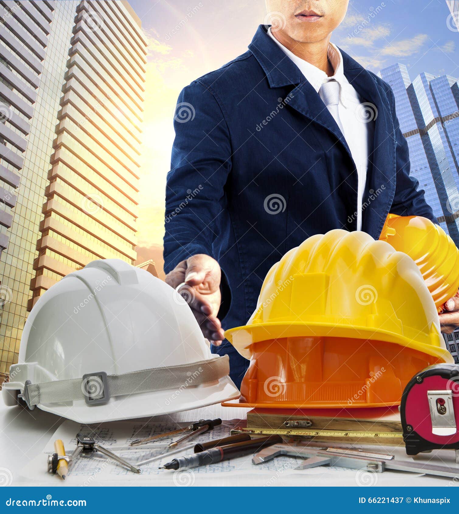 Engineer Man and Working Table Against Sky Scrapper in Urban Scene Use