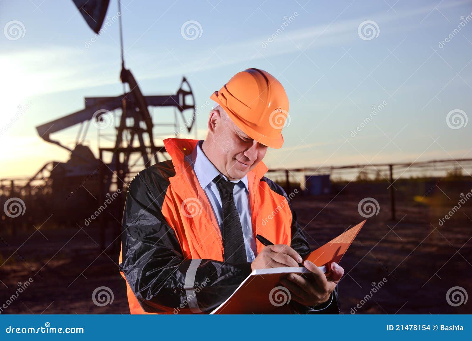 Engineer in an Oil field stock photo. Image of control 21478154