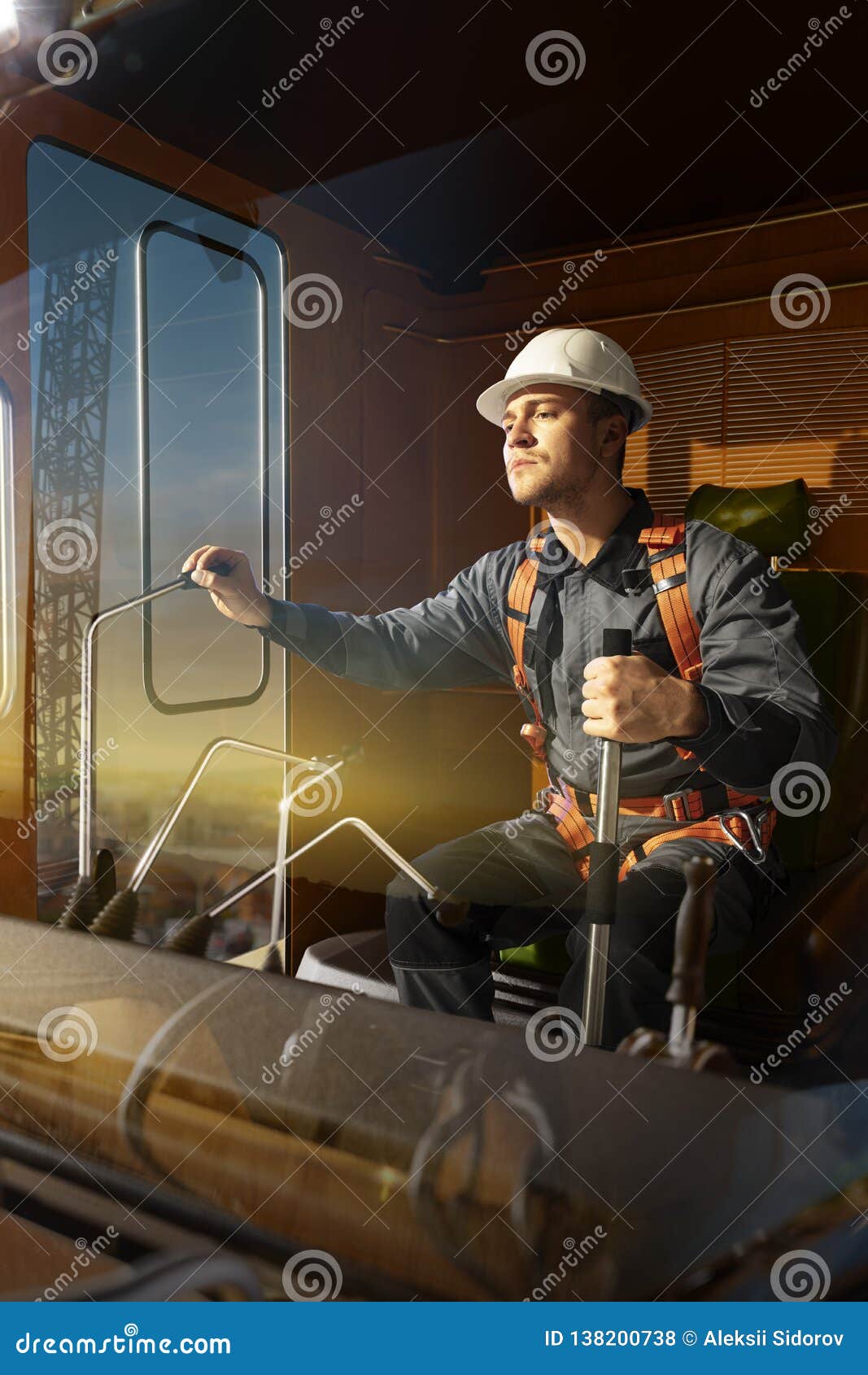 Engineer Operator Crane in Action . he Sit a Top in Crane Cabin and