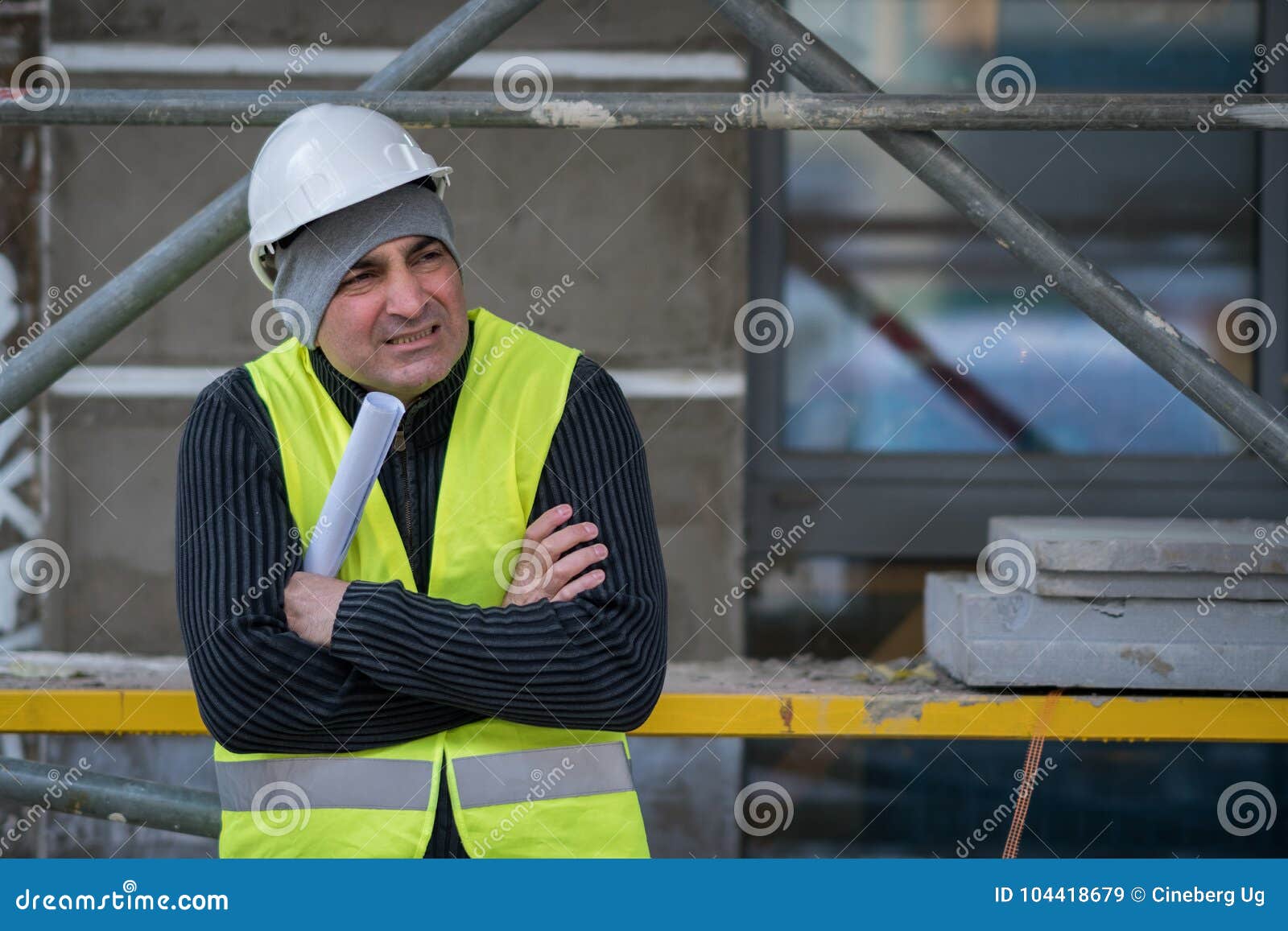 engineer with protective workwear freezing outdoors