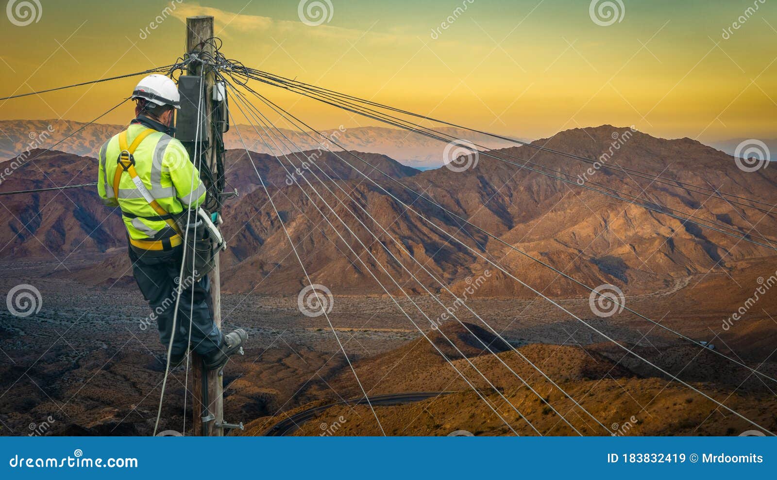 Engineer Repairing a Desert Telephone Line Editorial Stock Image