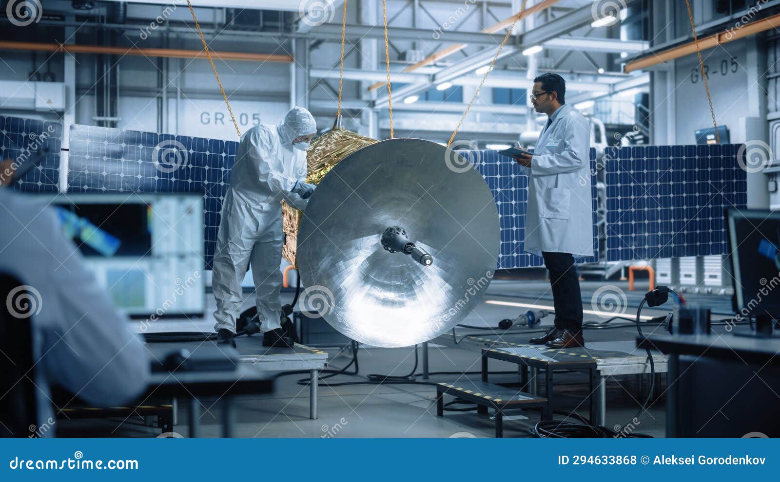 Engineer and Technician Working on Satellite Construction. Aerospace Agency Diverse Team of