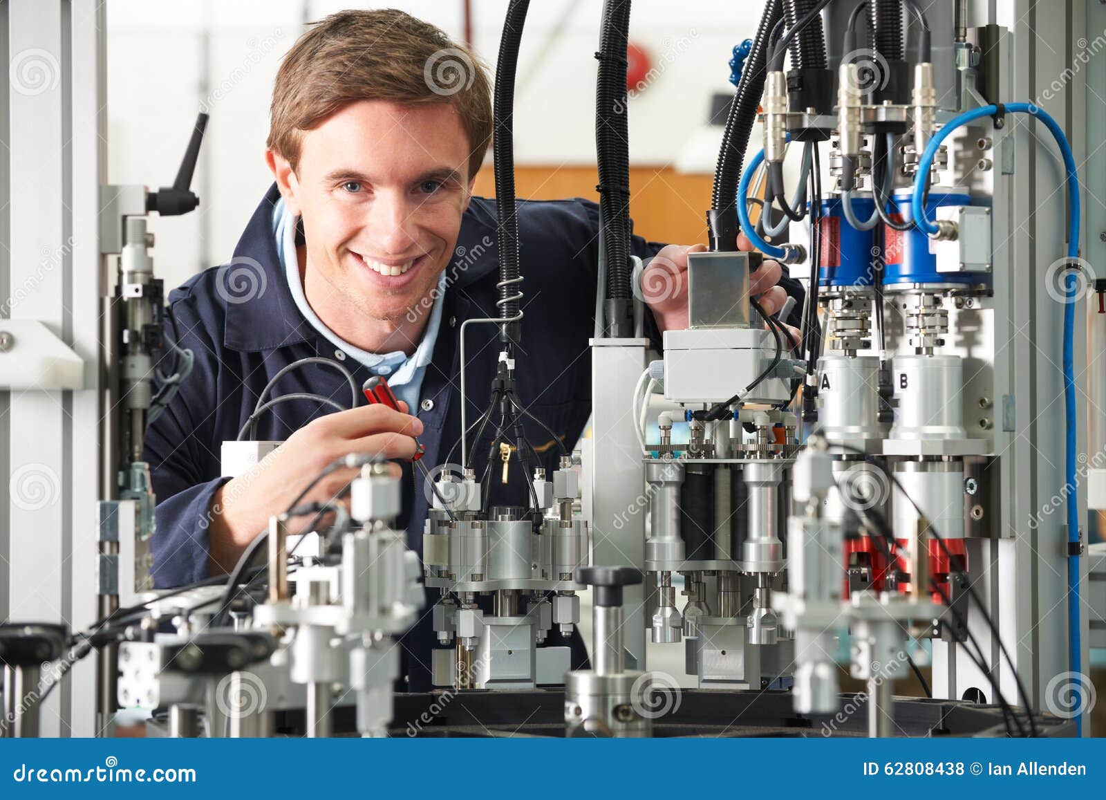 Engineer Working on Complex Equipment in Factory Stock Photo Image of