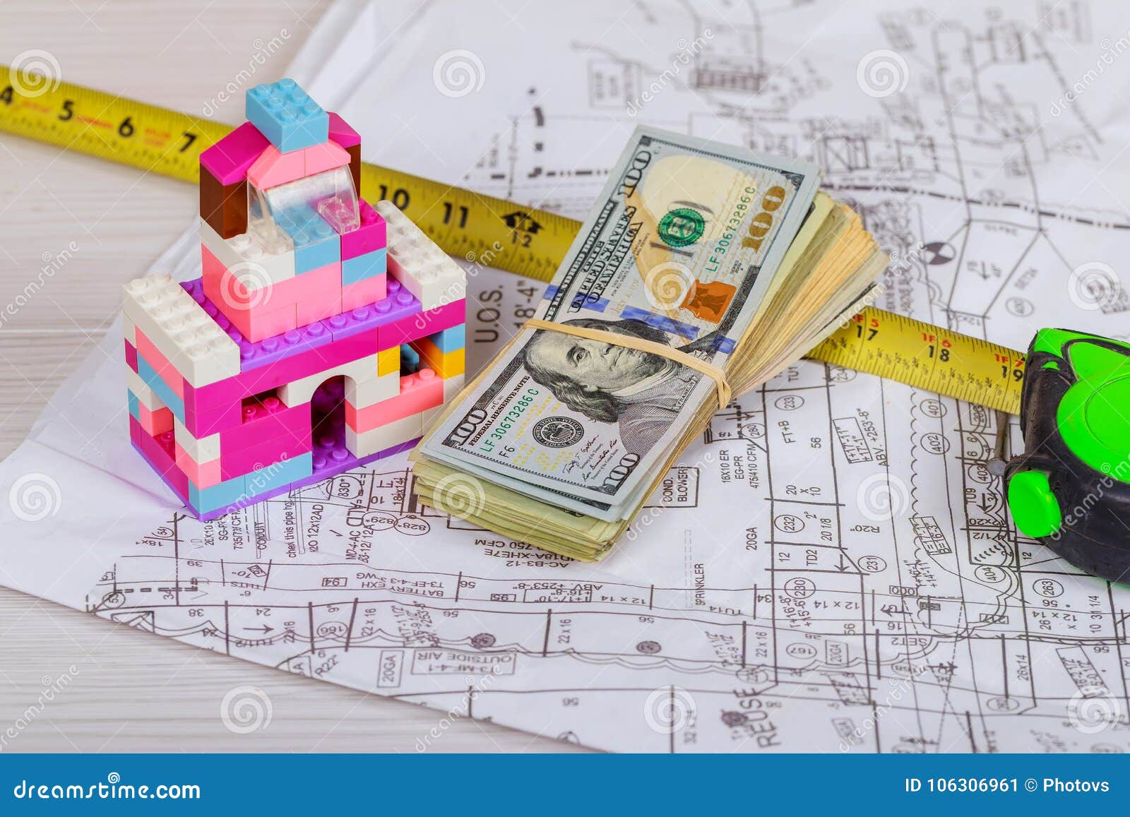 Engineer Working Table Plan and Blueprint at Building Construction Site