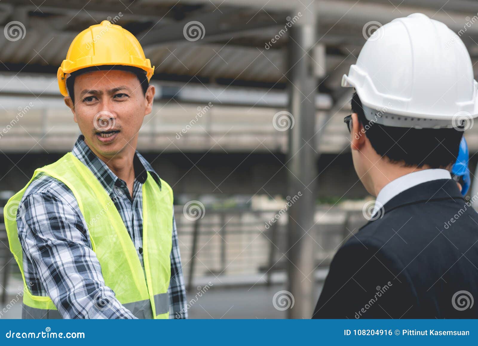 engineering construction teamwork concept : professional engineer work industrial project site
