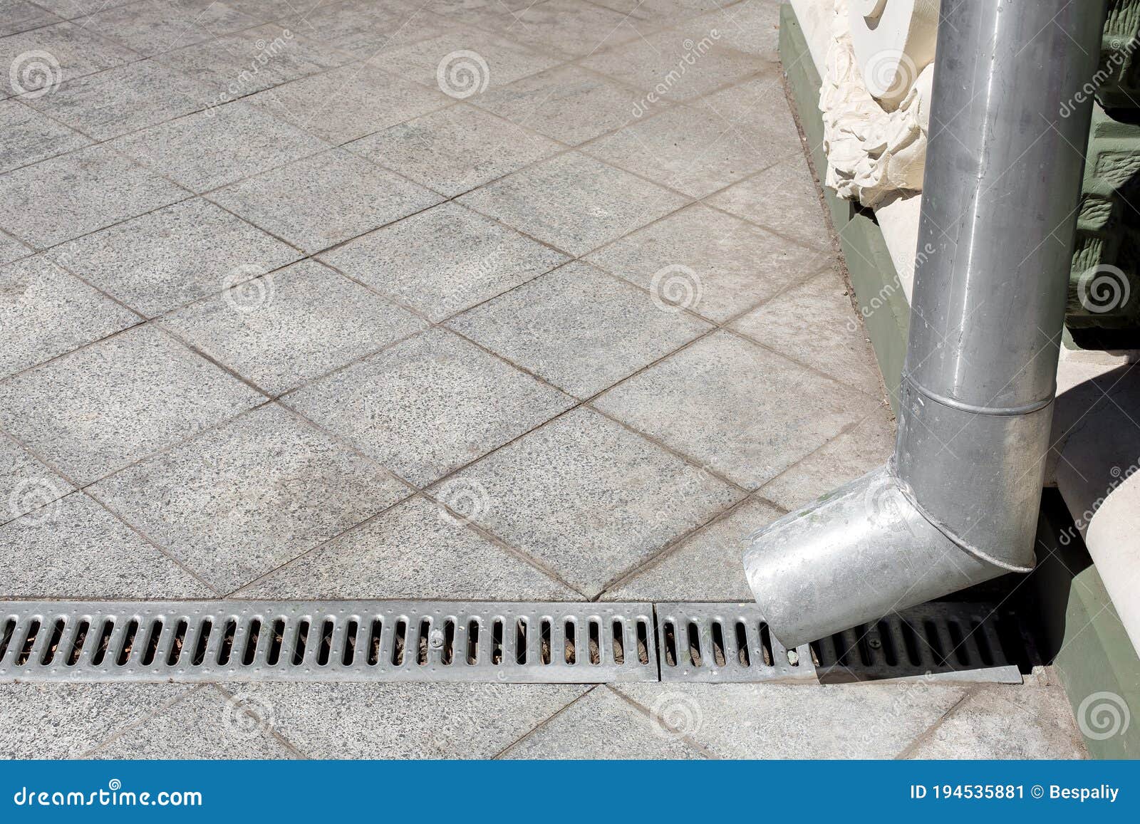 Engineering Structure a Downspout with a Drainage Grate. Stock Image