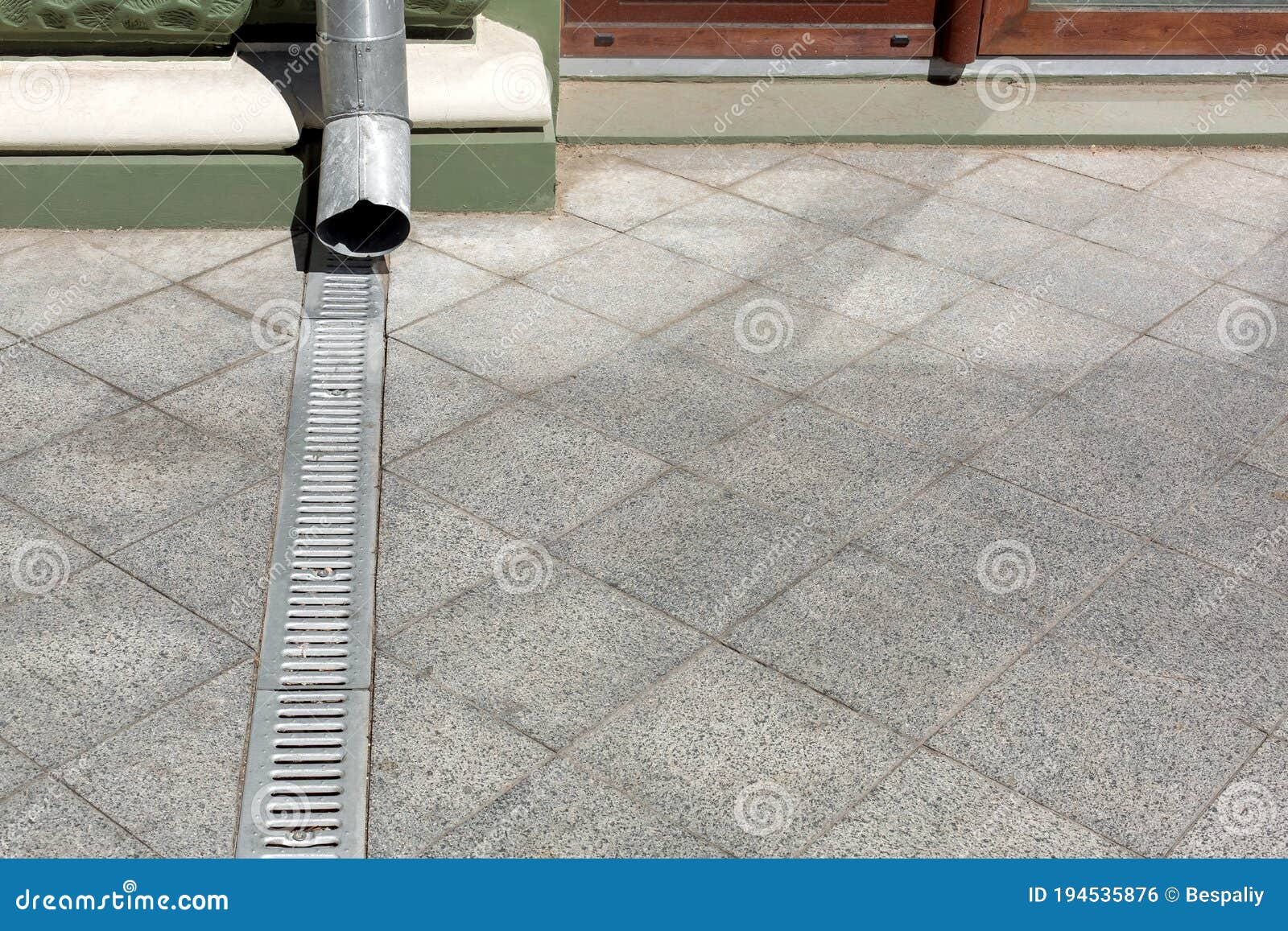 Engineering Structure Downspout on Facade Building with Drainage Grate