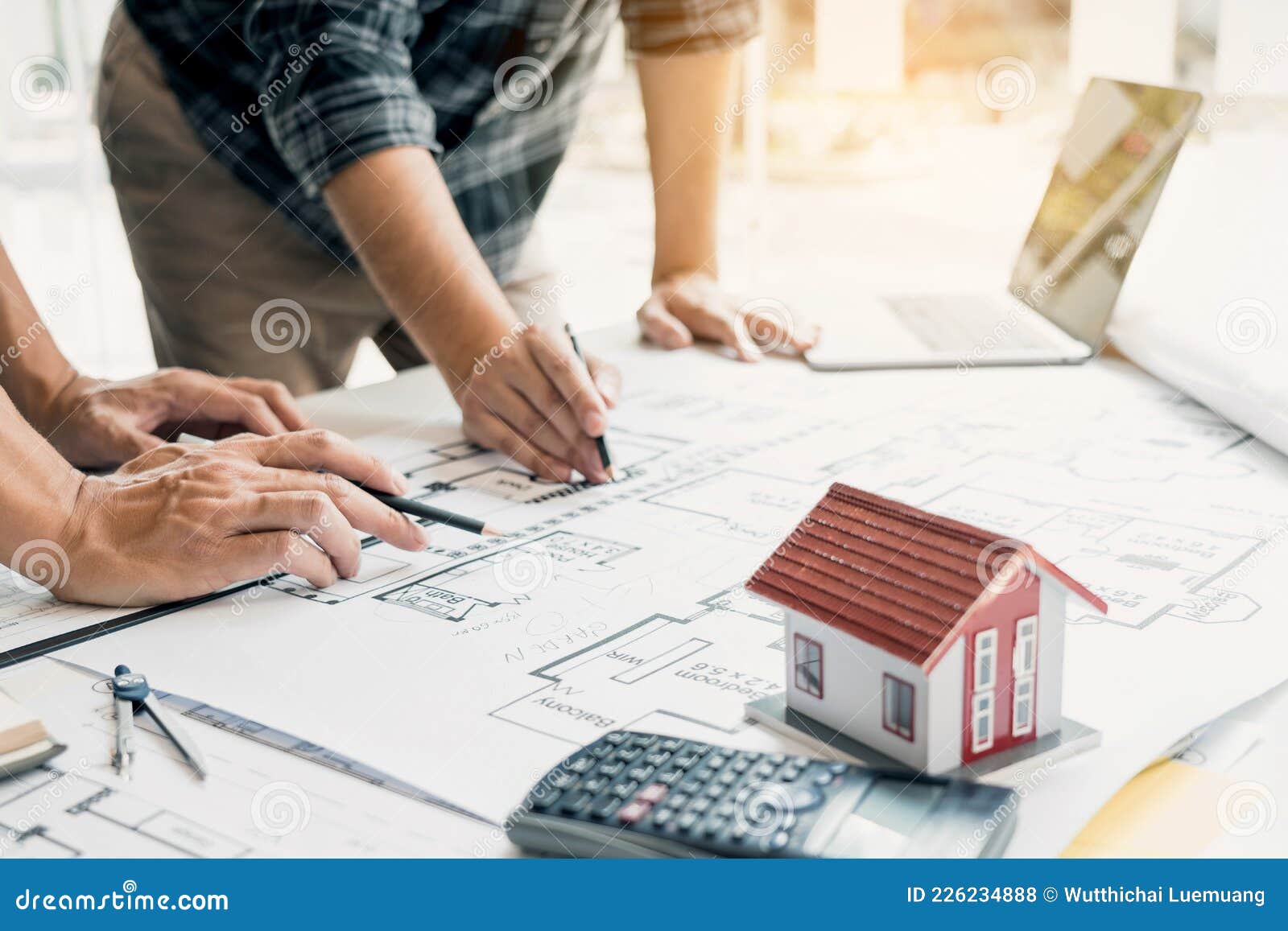 Engineers Are Helping To Design Work On Blueprints And Collaborate On