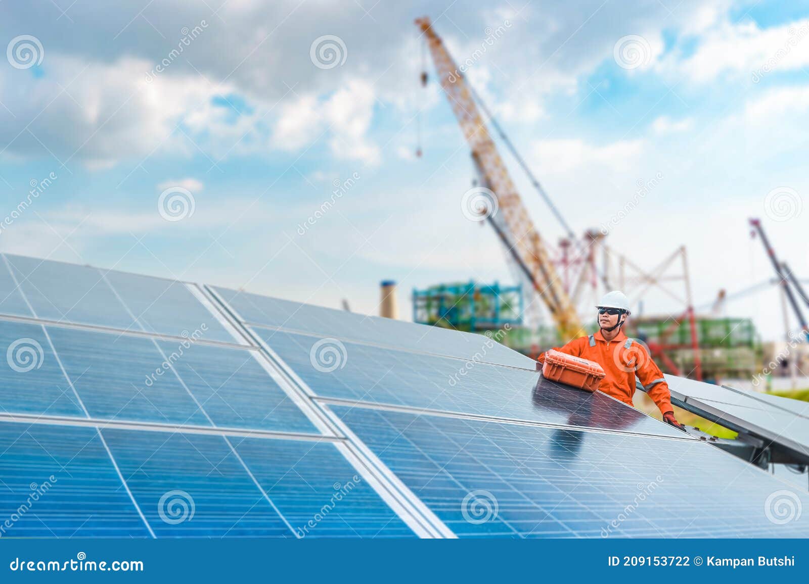 engineers hold a tool for checking the performance of the solar panel to confirming systems working normally. photovoltaic module
