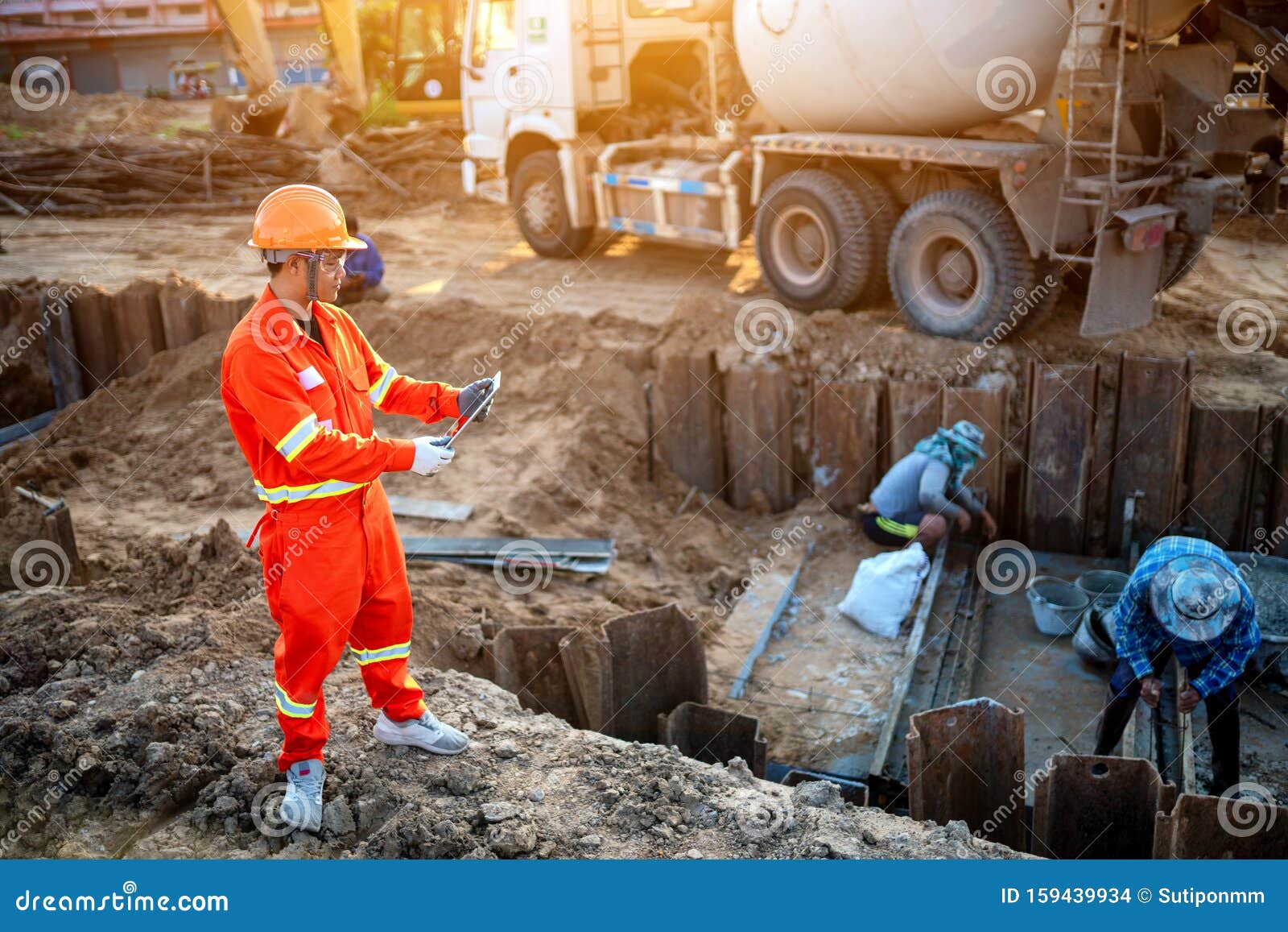 Engineers Inspect the Pouring of Concrete Stock Photo Image of construction, industry 159439934