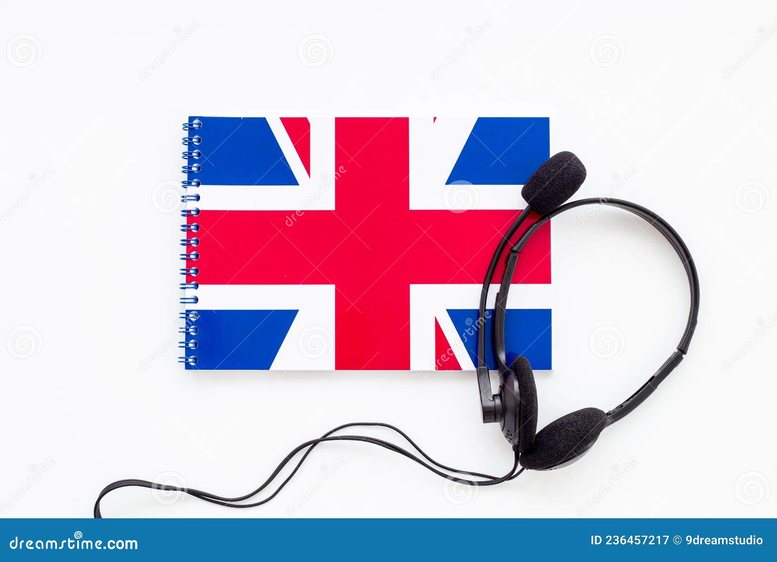 English Courses Concept. British Flag on Notebook and Headphones Stock