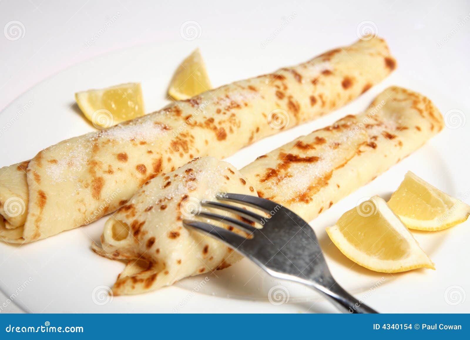 English Pancake Or Crepe, Sugar, Lemon And Fork Stock 
