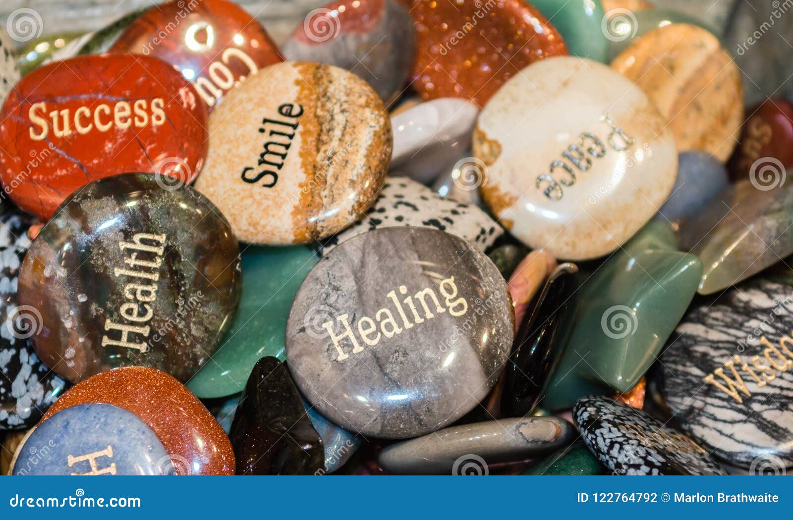 engraved rocks that show words of wisdom and encouragement stock