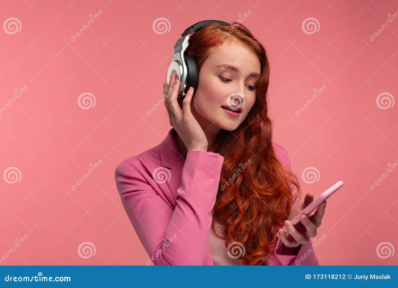 Enjoy Listening To Music. Beautiful Young Redhead Woman with Headphones  Listening Music on Smart Phone Using Music App Stock Photo - Image of  charming, playlist: 173118212