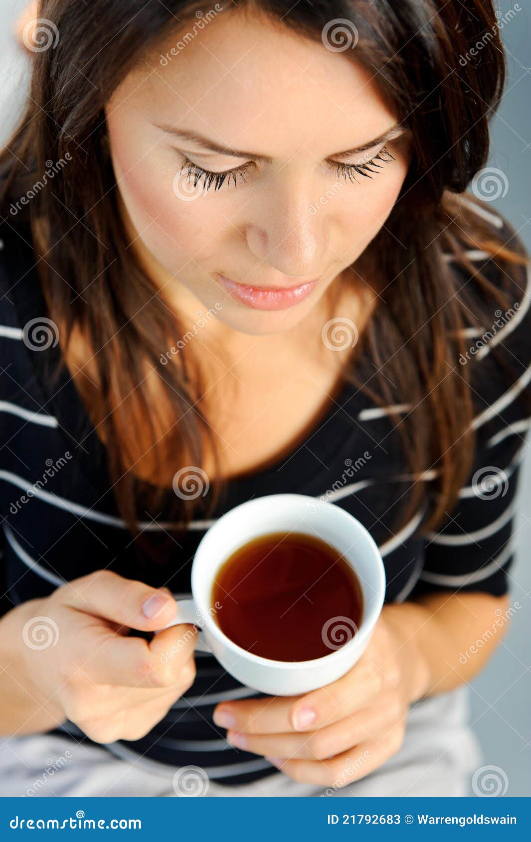 Enjoying her tea stock image. Image of brunette, attractive - 21792683