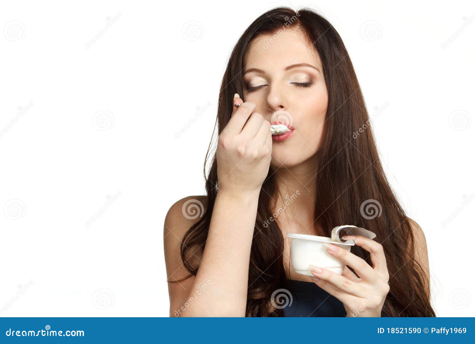 Enjoying taste of yogurt stock photo. Image of facial 18521590