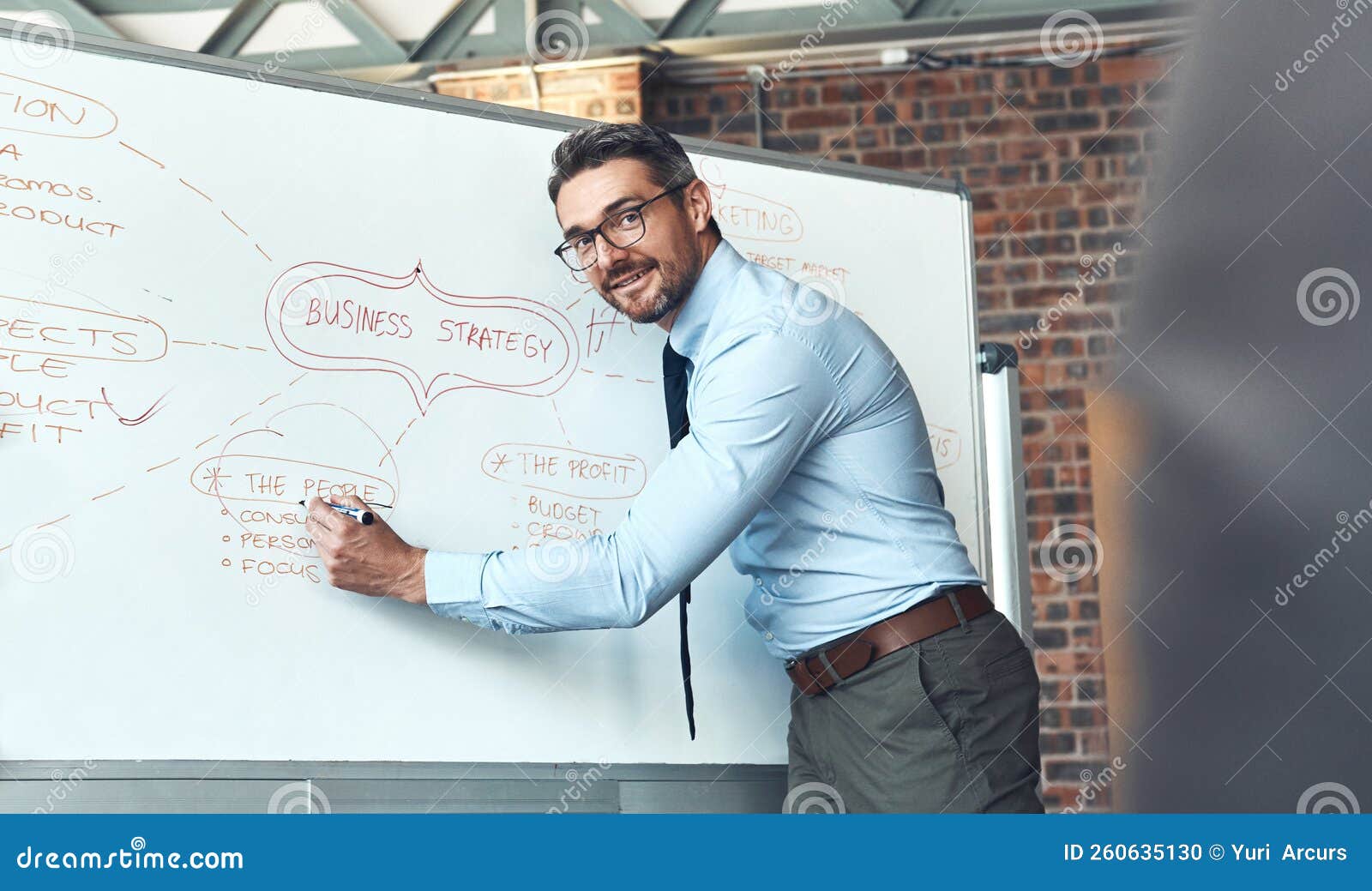 Ensuring Everyone Understands the Big Plan. a Mature Businessman Using