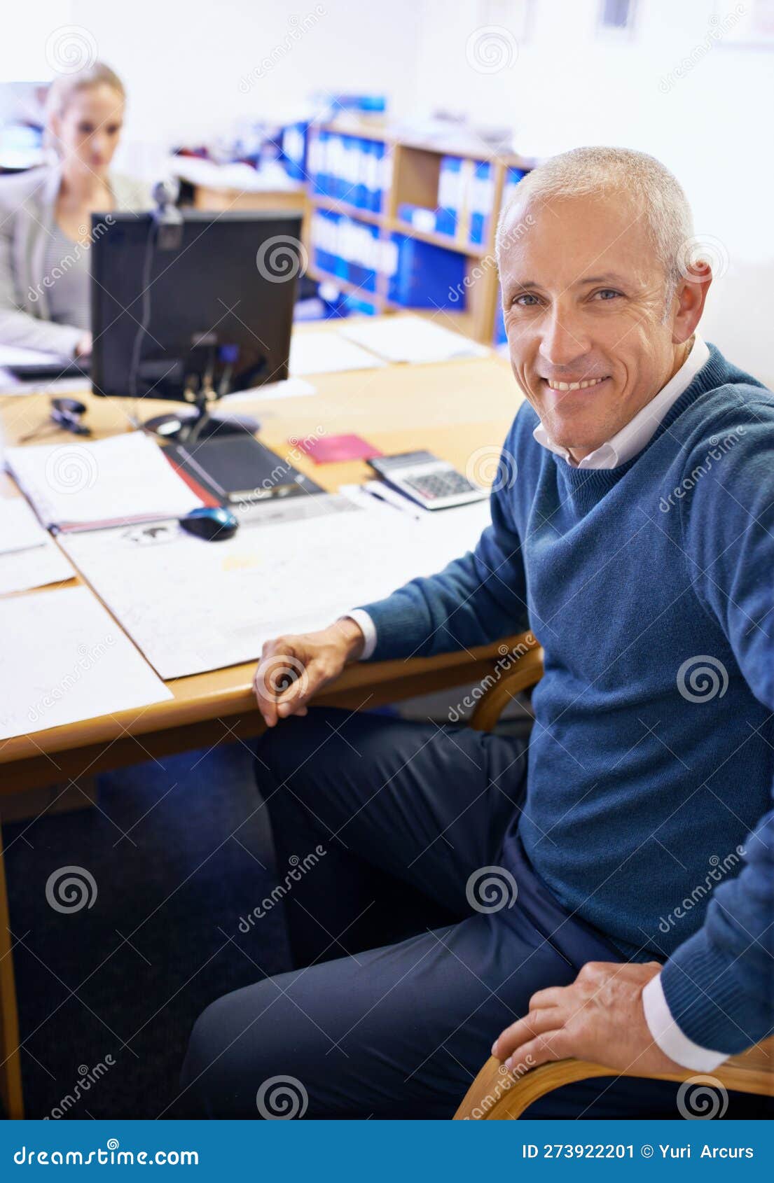 Ensuring Everything Runs Smoothly. a Two People Working at Their Desk