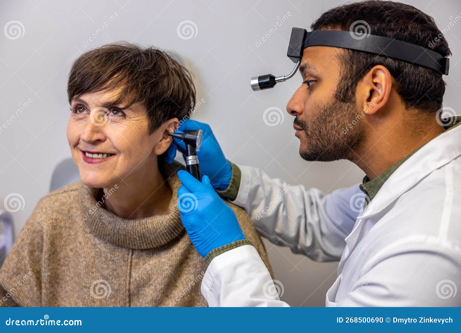 ENT Doctor Examining an Elderly Female Patient Stock Photo Image of