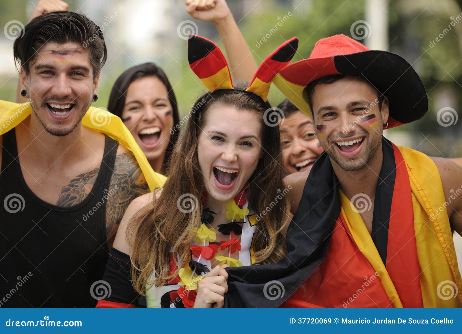 enthusiastic german sport soccer fans celebrating victory.