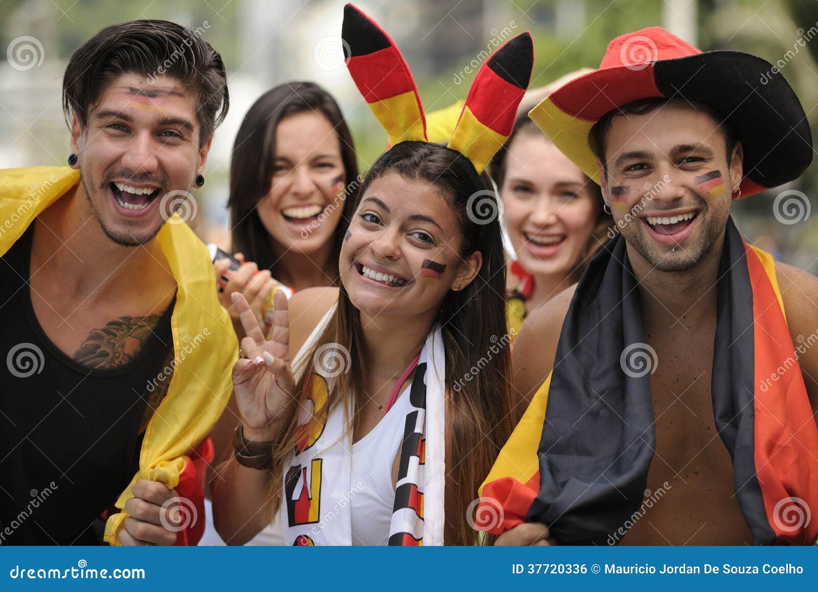 enthusiastic german sport soccer fans celebrating victory.