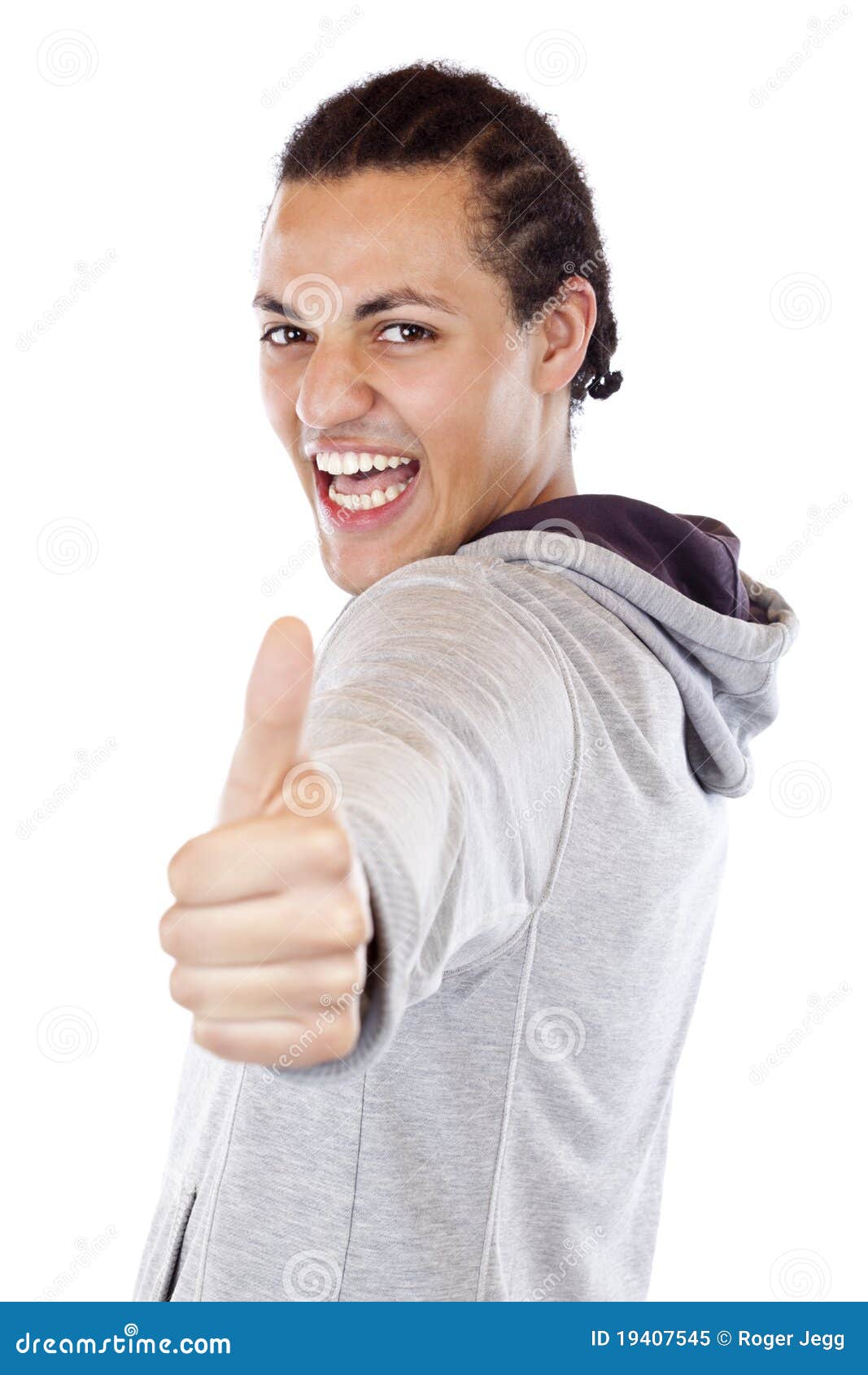 enthusiastic teenager holds thumb up