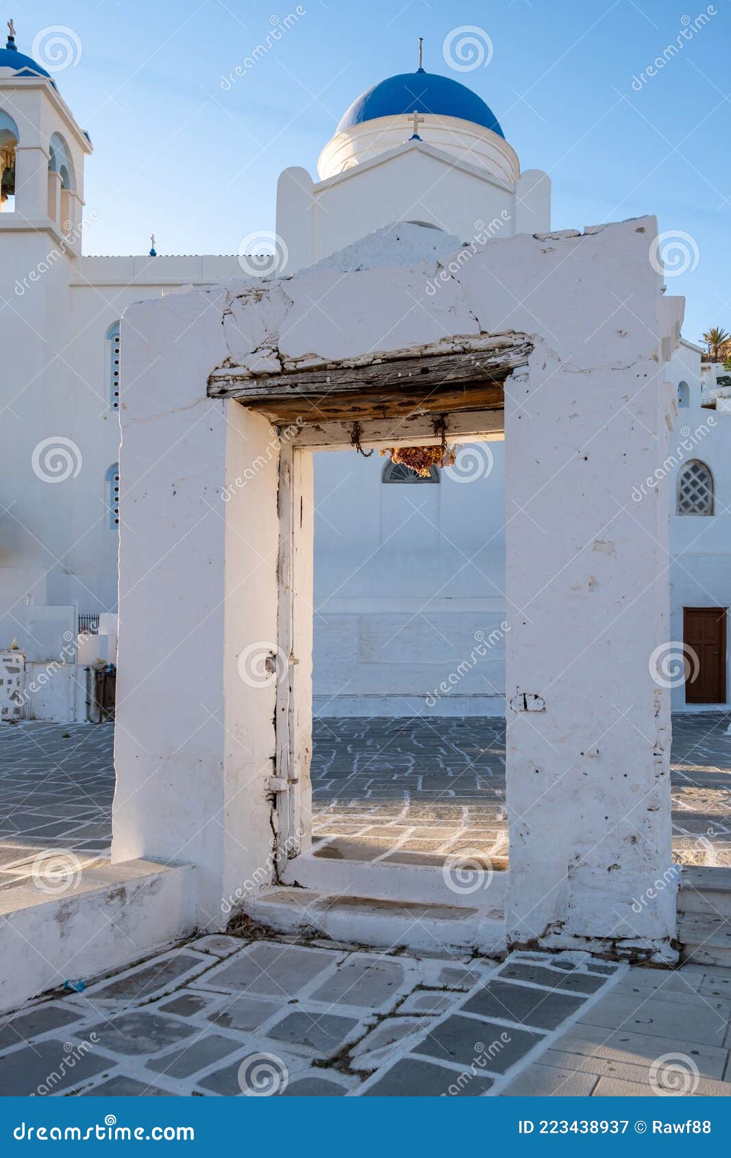 entrance gate of evangelismos cathedral church at ios, nios island, cyclades, greece. vertical