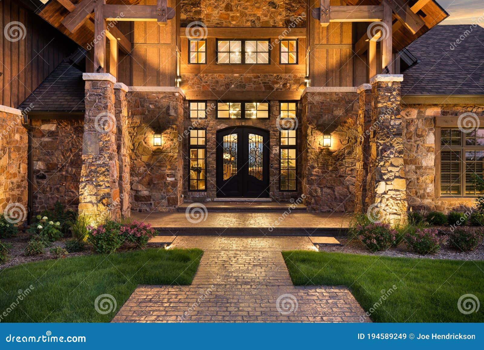 Modern House Exterior At Twilight. Luxury Villa With Garage. Stock Photo,  Picture and Royalty Free Image. Image 203466824.