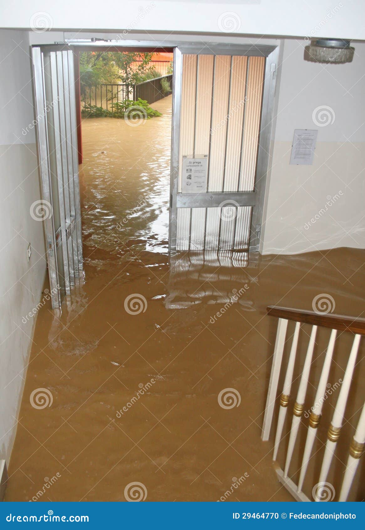 entrance and staircase of the house invaded by mud 2