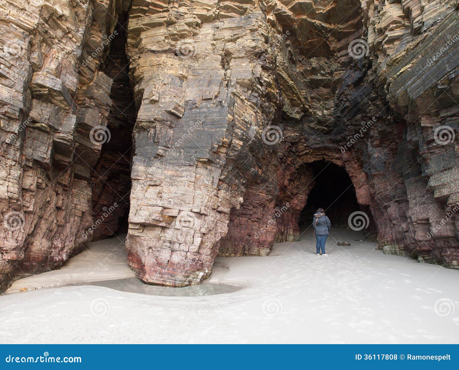 entrance to a cave in as catedrais beach, galicia, spain.