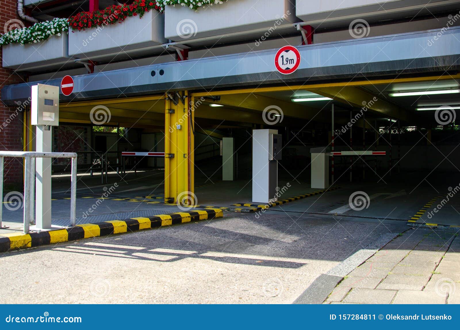 Entrance To the Parking Lot Stock Image - Image of automobile ...