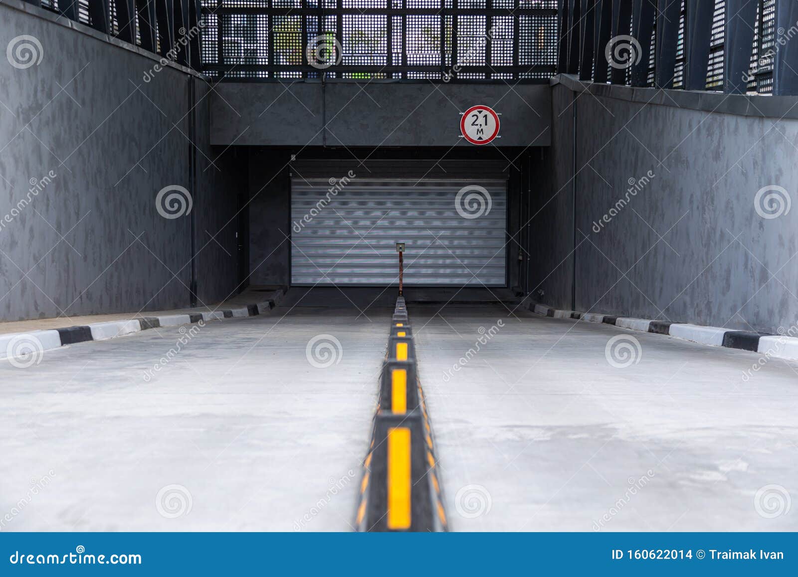 Entrance To Underground Parking Space with Roller-shutter Door and Road ...