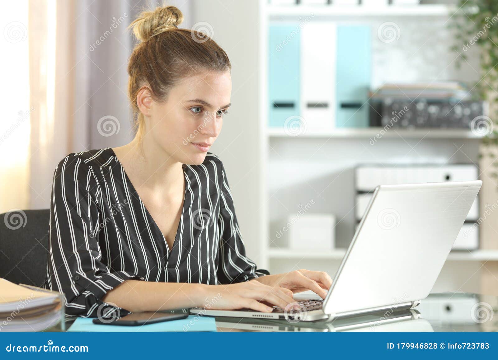 entrepreneur working on laptop at homeoffice