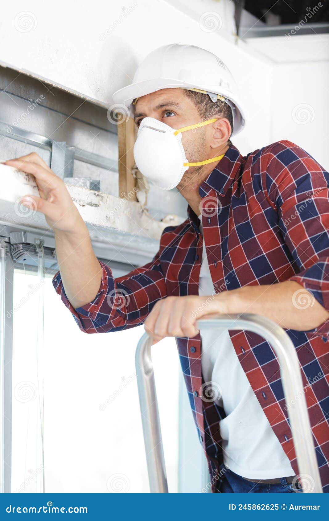 Environmental Abatement Worker Hangs Lead Hazard Caution Sign Stock