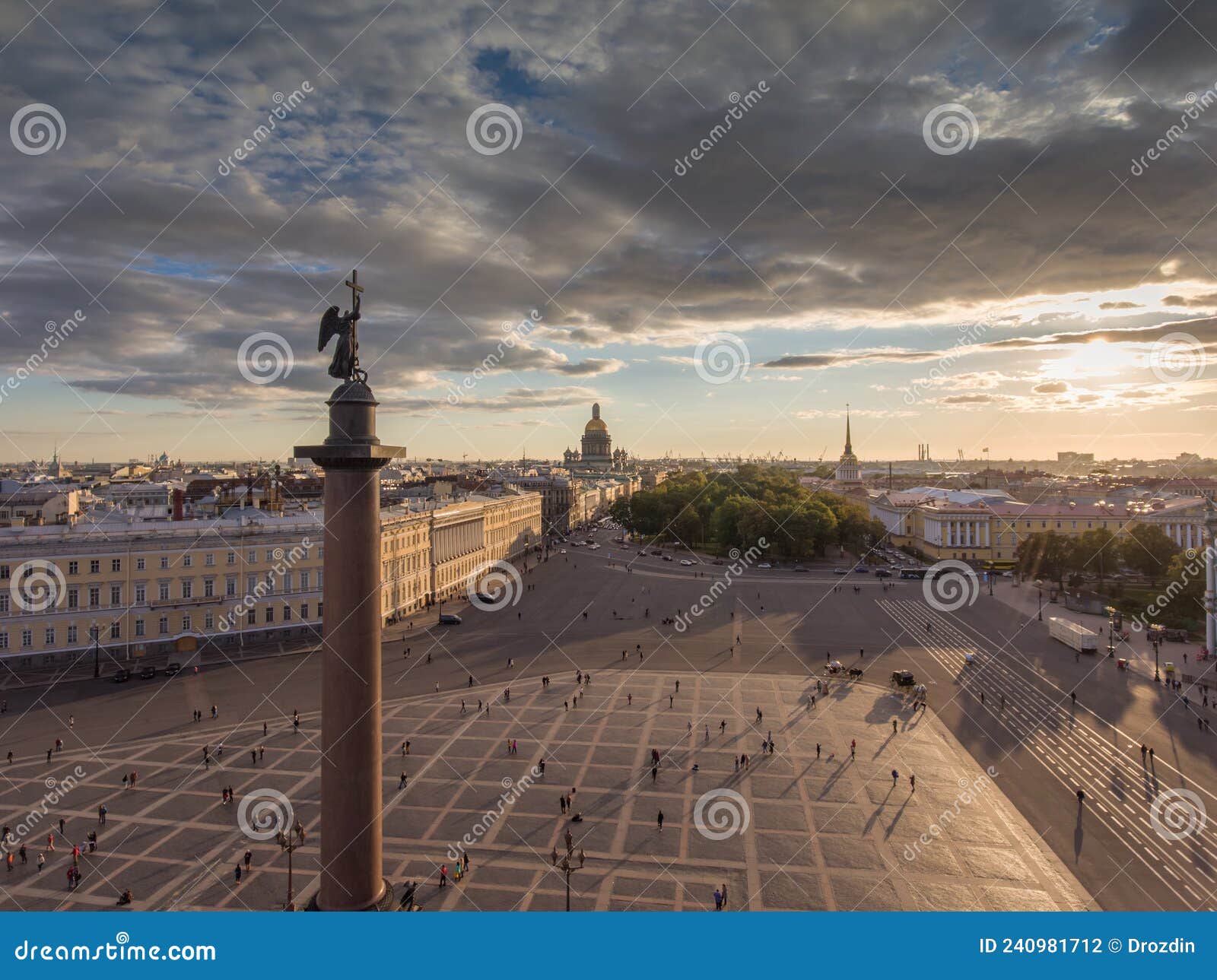 erial view of palace square and alexandr column at sunset, a gold dome of st. isaac's cathedral, golden spire of