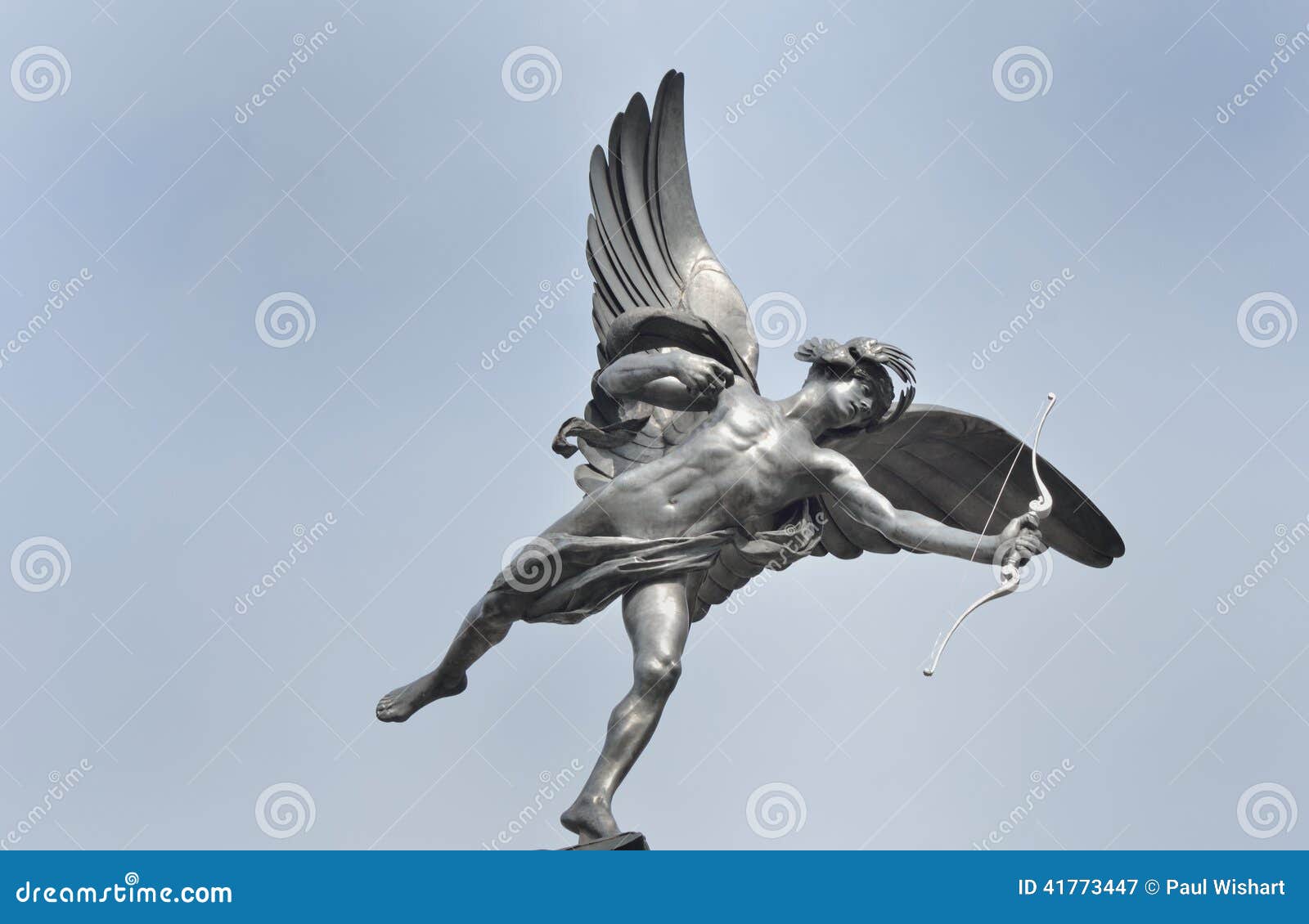 eros statue with blue sky