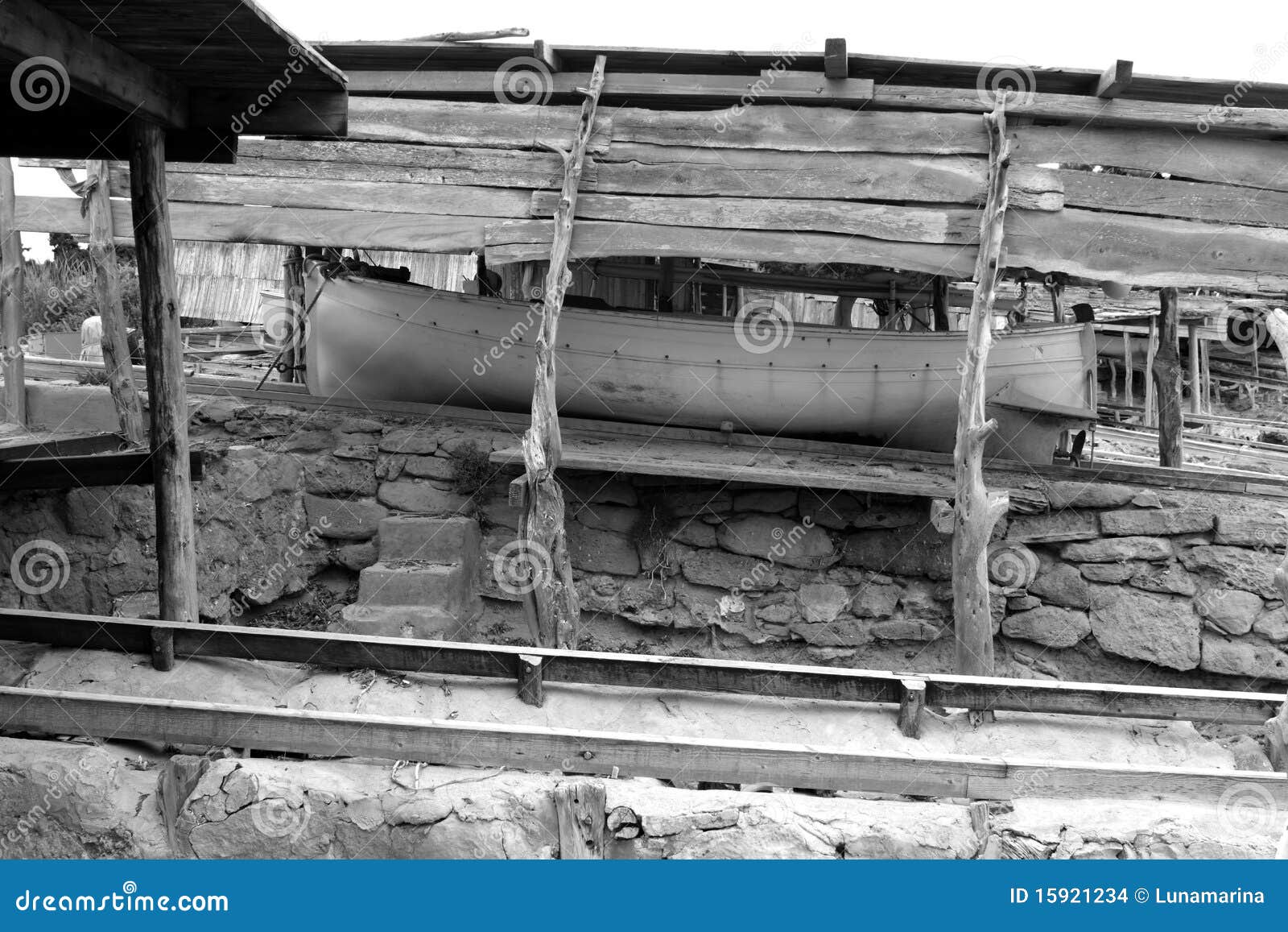 escalo formentera boat stranded wooden rails